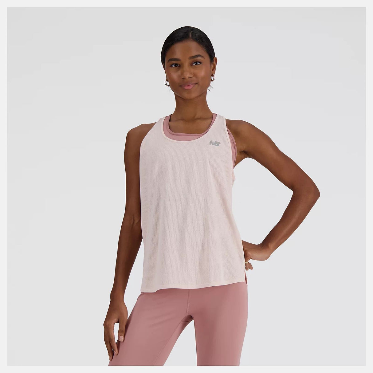NEW BALANCE ATHLETICS TANK PINK MUJER